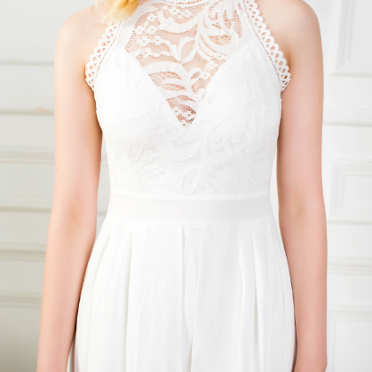 The Sheer Lace Dress Features A Slim, Sleeveless,..