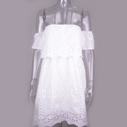 A Cotton Dress With Short Sleeves And A..
