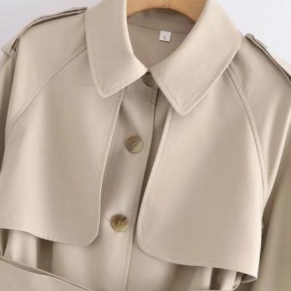 Elegant Beige Trench Coat With Belted Waist And..